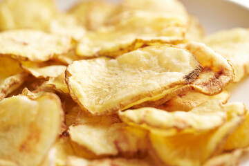 dry potato chips on a plate