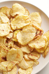 dry potato chips on a plate	