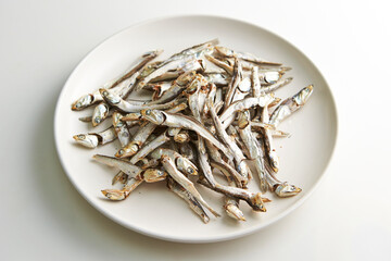 dried anchovies on a plate