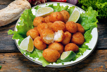 cod dumpling, salt cod fritters, bunuelos de bacalao. Brazilian snack 