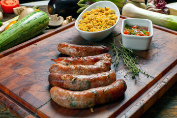 Pork sausage with farofa and vinaigrette