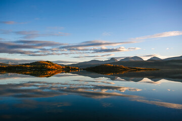 Mountain reflected in cold water of Balsfjord, Northern Norway