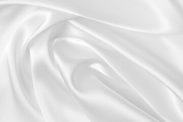 Elegance white satin silk with waves, abstract background luxury cloth, elegant wallpaper design. Abstract background luxury cloth or liquid wave