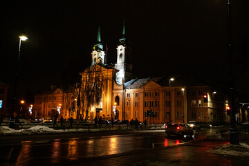 Fototapeta na wymiar Cathedral in Warsaw illuminated at night before Christmas. Winter.