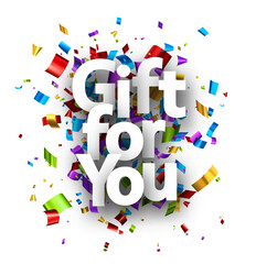 Gift for you sign with colorful cut out foil ribbon confetti background.