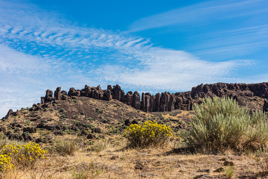 Basalt columns formed when molten lava cooled towering over the Eastern Washington high desert near George; Washington, United States of America