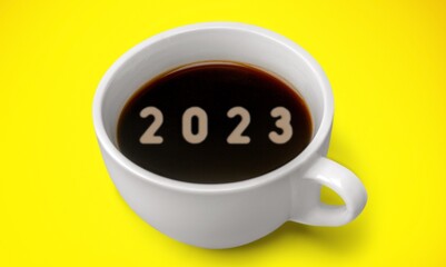 Greeting new year concept coffee numbers with 2023