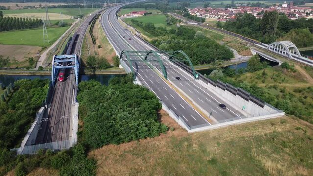 Aerial view of the highway and high speed rail, Bernate, near Milan, Italy