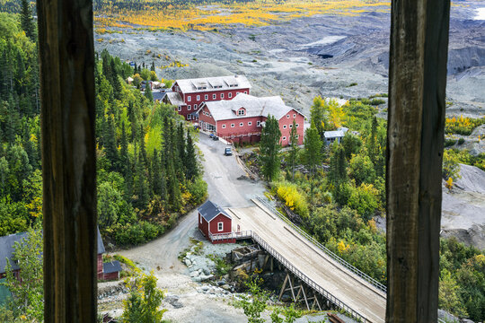 Looking out the top window of the concentration mill, one can see the former store and post office at Kennecott Copper Mine. It is now a Visitor Center; McCarthy, Alaska, United States of America