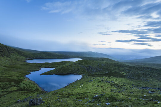 Dawn view over two lakes in the Galty Mountains; County Limerick, Ireland