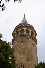 View of Galata Tower of Istanbul in Turkey. Sky and cloud background. View of Istanbul. Turkish name: Galata Kulesi. August, 2022.