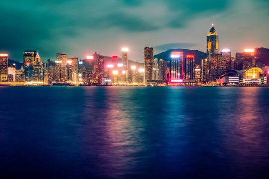 Long exposure at twilight of Hong Kong skyscrapers taken from Tsim Tsa Tsui; Hong Kong, Hong Kong Special Administrative Region (SAR), Hong Kong