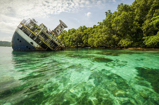 Shipwrecked World Discoverer cruise in tropical waters of the Solomon Islands, Roderick Bay; Nggela Islands, Solomon Islands