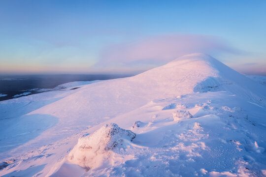 Snow-covered peak of Galtee Mor at sunrise in winter, Galty Mountains; County Tipperary, Ireland