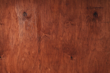 Vintage brown wood background texture with knots and nail holes. Old painted wood wall. Brown abstract background. Vintage wooden dark horizontal boards.