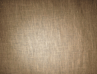 Abstract background with a gradient of rough fabric, backlit by a lantern