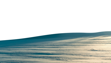 A hilly field covered with snow on a sunny day