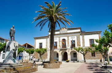 Naklejka premium Monument dedicated to Fernando Casariego and Town Hall in background, Tapia de Casariego, Asturias, Spain