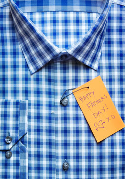 Close-up of Shirt with Happy Father's Day Tag