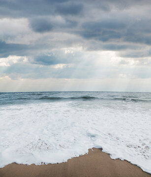 Waves at Beach with Sunrays through Clouds, Point Pleasant, New Jersey, USA