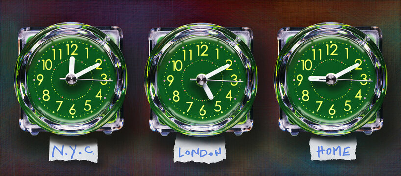 Panoramic of Three Plastic Clocks Showing Time Zones, Studio Shot