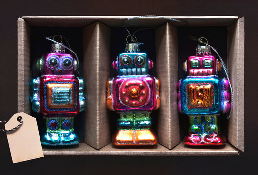 Three Robot Ornaments in Box with Label, Studio Shot