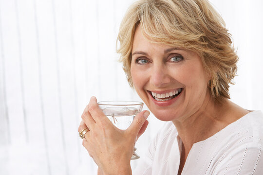 Woman with Glass of Water