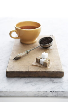 Tea Cup and Tea Strainer