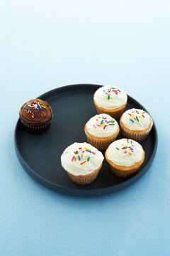 Chocolate Cupcake Separated from Vanilla Cupcakes