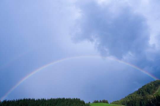Rainbow over Field and Trees, Salzburg, Austria
