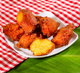 Fried tender corn croquettes - Colombian traditional food