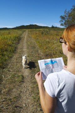 Hiker Looking at Map