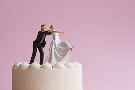Wedding Cake Figurines, Groom Grabbing Runaway Bride