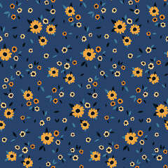 Seamless floral pattern, liberty ditsy print with small plants on a blue background. Cute flower design for fabric or paper with tiny hand drawn flowers, leaves. Vector illustration.