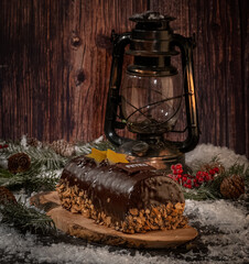 succulent chocolate Yule log in a Christmas decoration