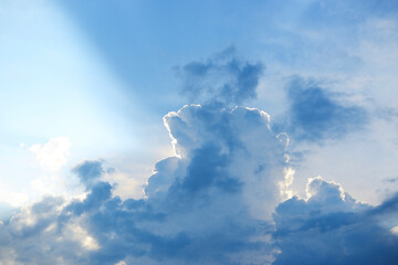 Cloud formation with sunbeams