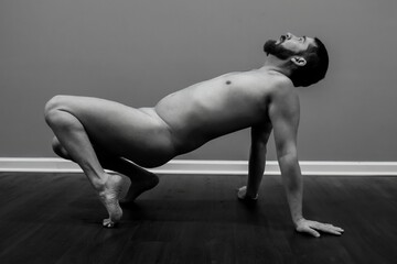 nude male model in hot yoga poses for artistic posing and modeling naked