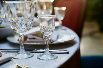 empty wine glasses on the table.table setting for a festive dinner. 