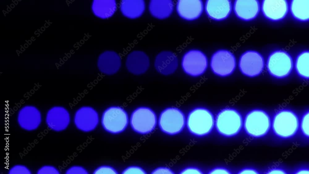 Wall mural loop 4k footage. abstract light blue dot background. glowing blue light stripes on dark background. 