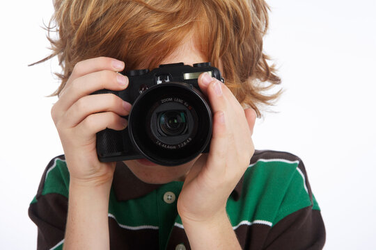 Boy Holding Camera
