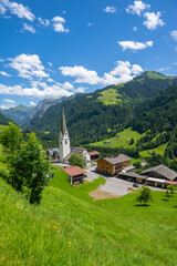 Fototapeta na wymiar Village of Sonntag in the Grosswalsertal valley, Vorarlberg, Austria