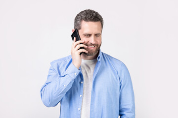 photo of cheerful man having communication call. man has communication call on phone