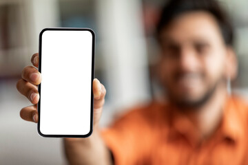 Modern smartphone with white blank screen in male hand