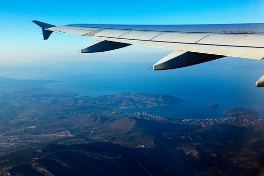 Airplane Wing and Aerial View of Coastline, Athens, Attica, Greece