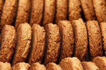 Sweet crisp freshly baked oatmeal, stacked one by one, conveniently packaged