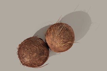 Coconut on neutral background. Food concept.