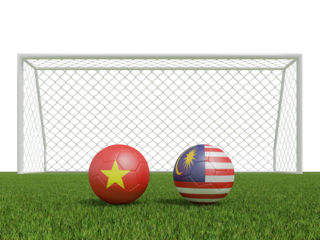 Footballs in flags colors on soccer field. Vietnam with Malaysia. 3d rendering