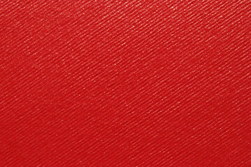 Fototapeta premium Red ribbed colored craft paper texture with golden glitter effect 