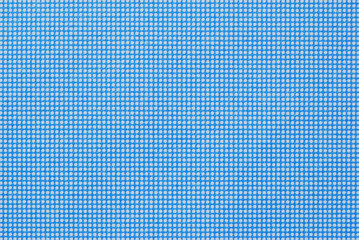 A sheet of blue dotted paper texture and background

