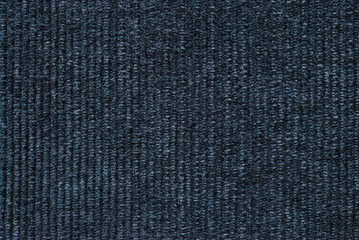Navy blue corduroy fabric texture as background